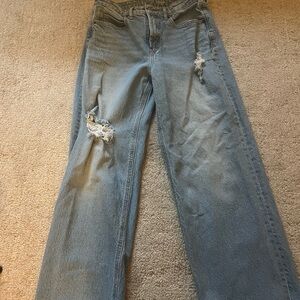 Women's Distressed Blue Jeans
